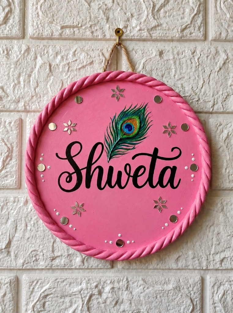 Mayura Pankhi — 8-Inch Blossom Pink Personalized Name Medallion — handmade blossom rose pink wooden plaque with hand-sculpted twisted rope clay border, miniature painted peacock feather (mor pankh), starburst mirrors and custom script by Rachna Saxena