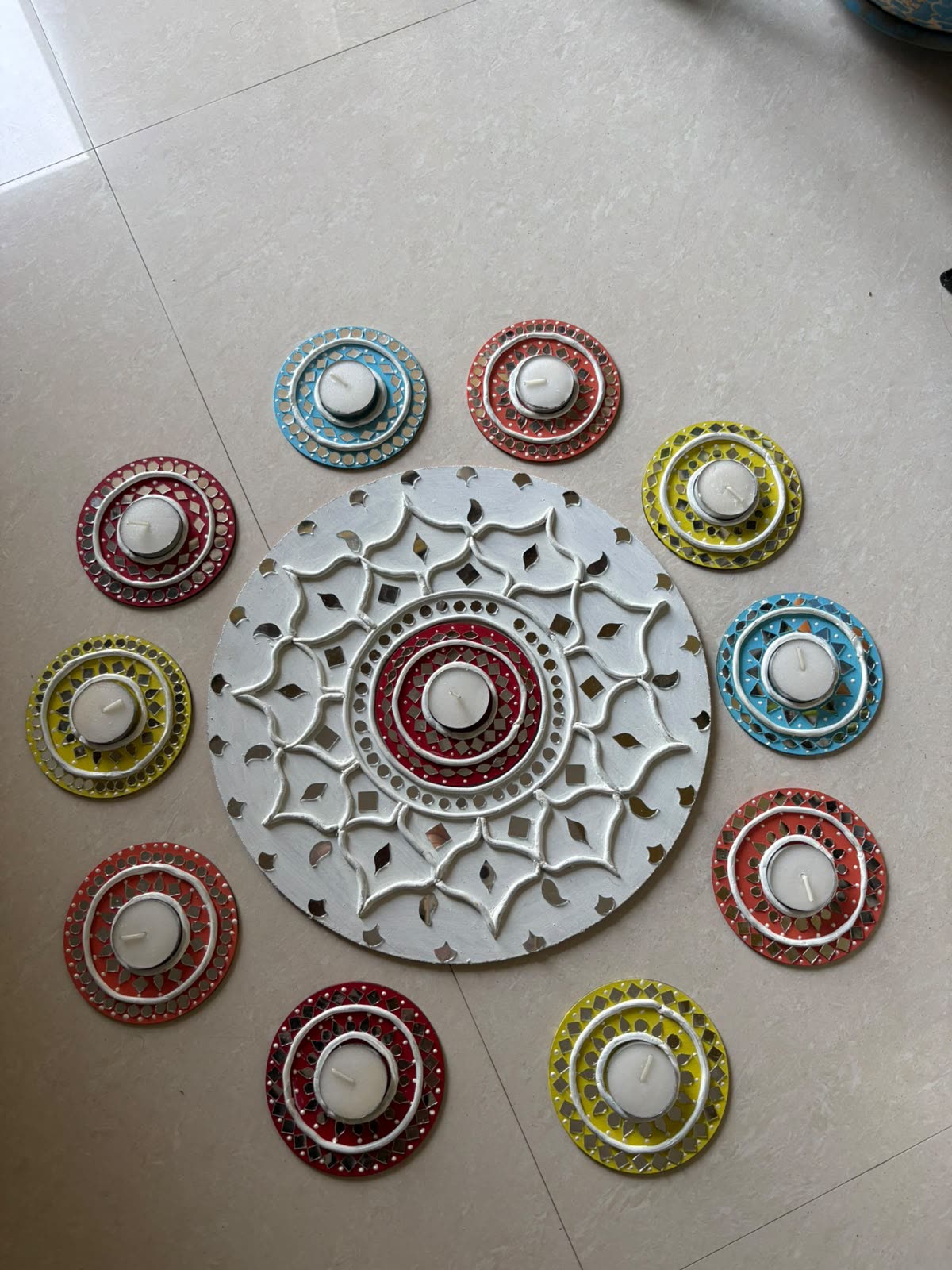 Rangoli Deep — Readymade Lippan Rangoli Set — handmade 12-inch white clay relief centre rangoli with mirror inlay, 11 matching 4-inch mirror-work candle holders & extra tealight candles by Rachna Saxena